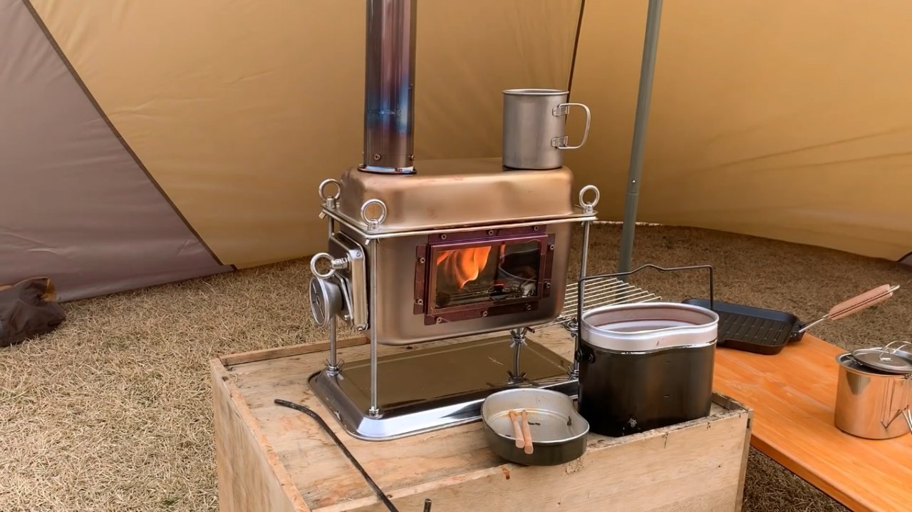 Купить мобильную печку. Дровяная печь с теплообменником для палатки. Мини печь дровяная походная. Мини печь дровяная походная для палатки. Буржуйка для палатки.